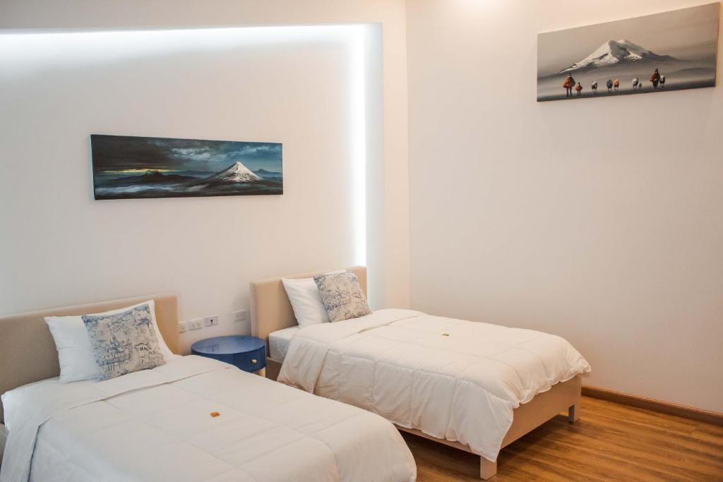 Postel nebo postele na pokoji v ubytování Adamas House Hotel Boutique