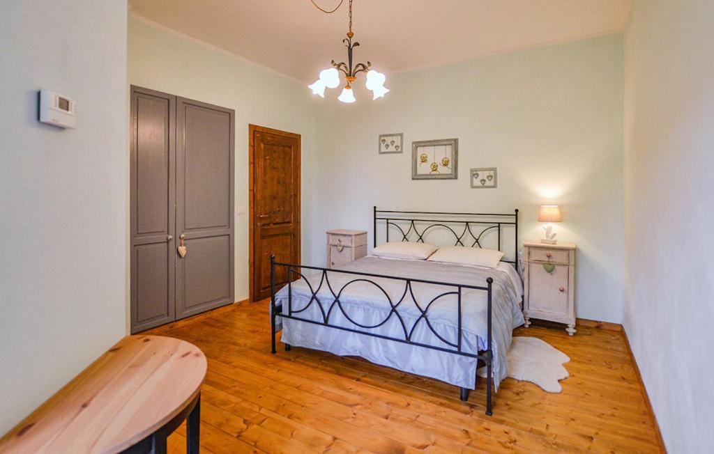 A bed or beds in a room at Il Meriggeto