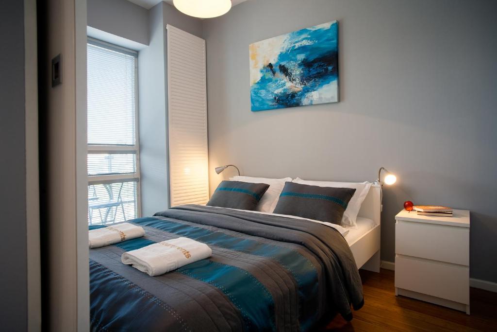 Postel nebo postele na pokoji v ubytování Platinum Towers Luxury Apartments
