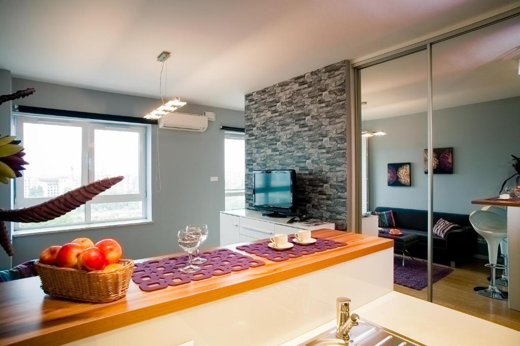 TV a/nebo společenská místnost v ubytování Platinum Towers Luxury Apartments