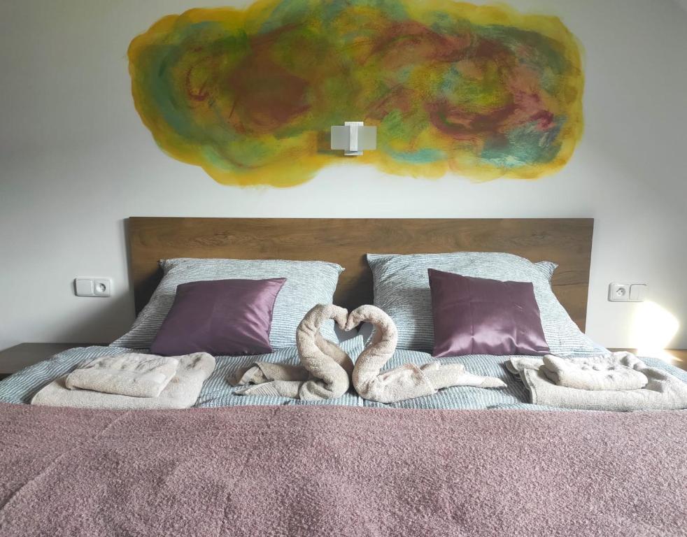 Postel nebo postele na pokoji v ubytování Kamrovec