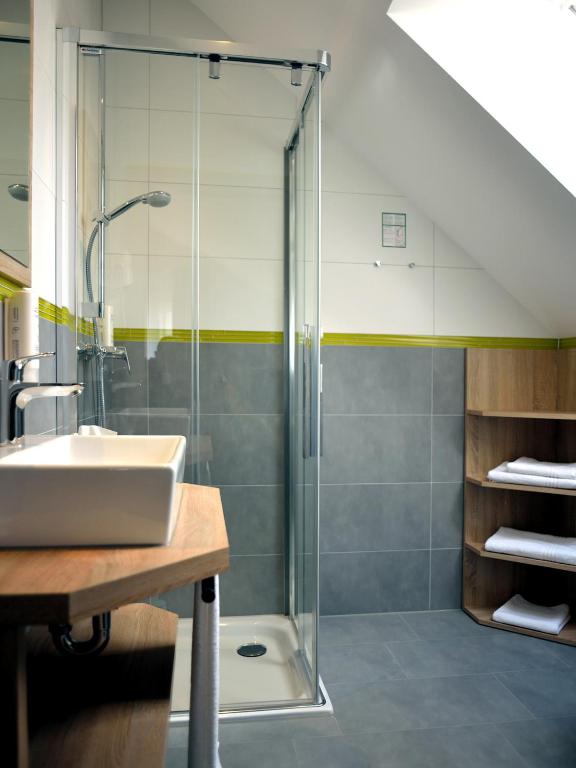 Koupelna v ubytování R & J Hotel