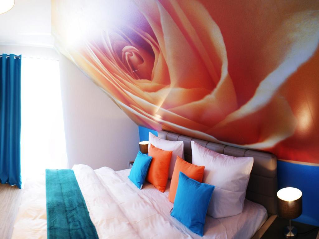 Postel nebo postele na pokoji v ubytování R & J Hotel
