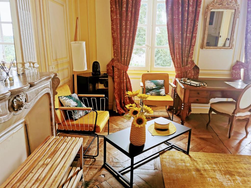 Posezení v ubytování Les chambres d'hôtes du Manoir de Roz-Maria