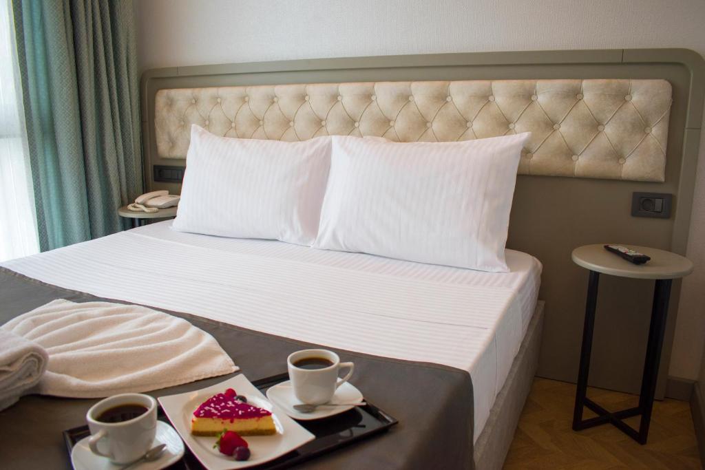 Postel nebo postele na pokoji v ubytování Mayer Hotel Istanbul