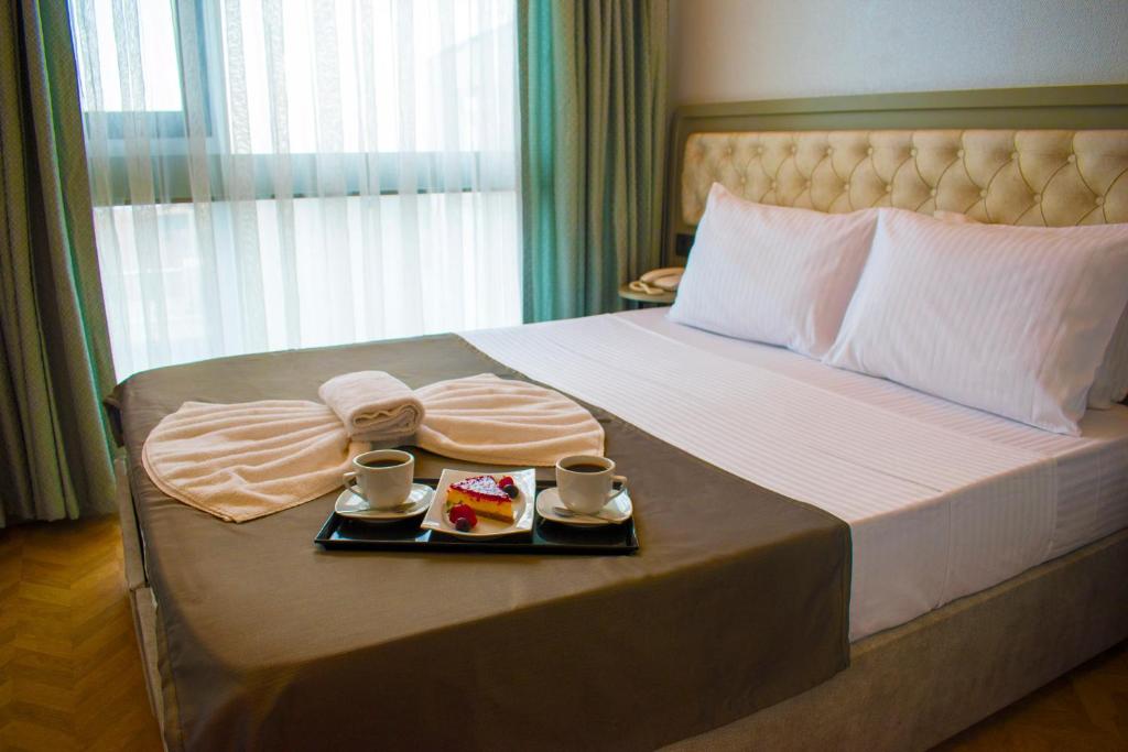 Postel nebo postele na pokoji v ubytování Mayer Hotel Istanbul