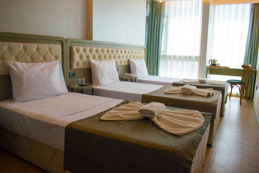 Postel nebo postele na pokoji v ubytování Mayer Hotel Istanbul