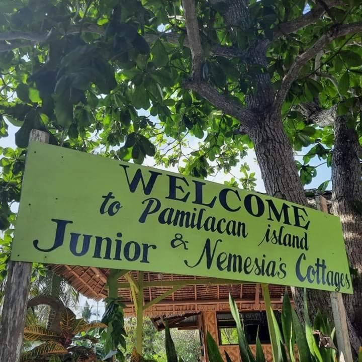 a sign for a welcome to panama to panamaincial junior junior and teenagers at Junior & Nemesia's Cottages in Baclayon