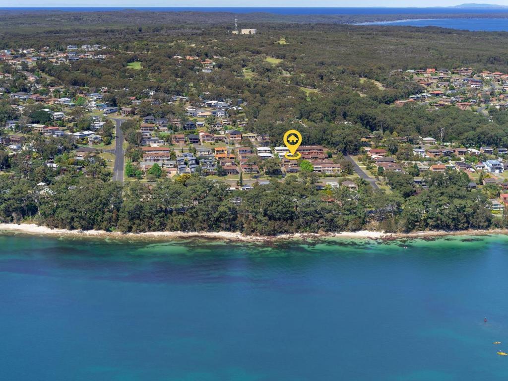 an aerial view of an island in the water at Catch of the Bay by Experience Jervis Bay in Vincentia