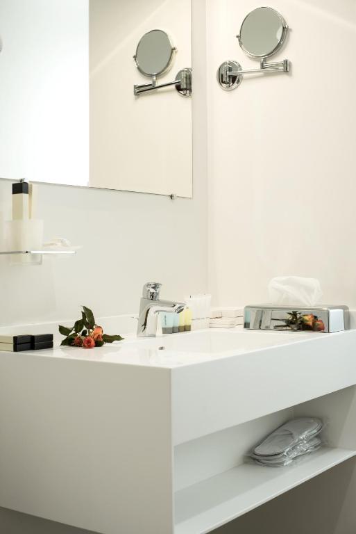 Kuchyň nebo kuchyňský kout v ubytování Arève Résidence Boutique Hotel