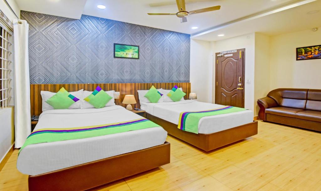 Postel nebo postele na pokoji v ubytování Itsy Hotels Igloo Residency Raja Seat