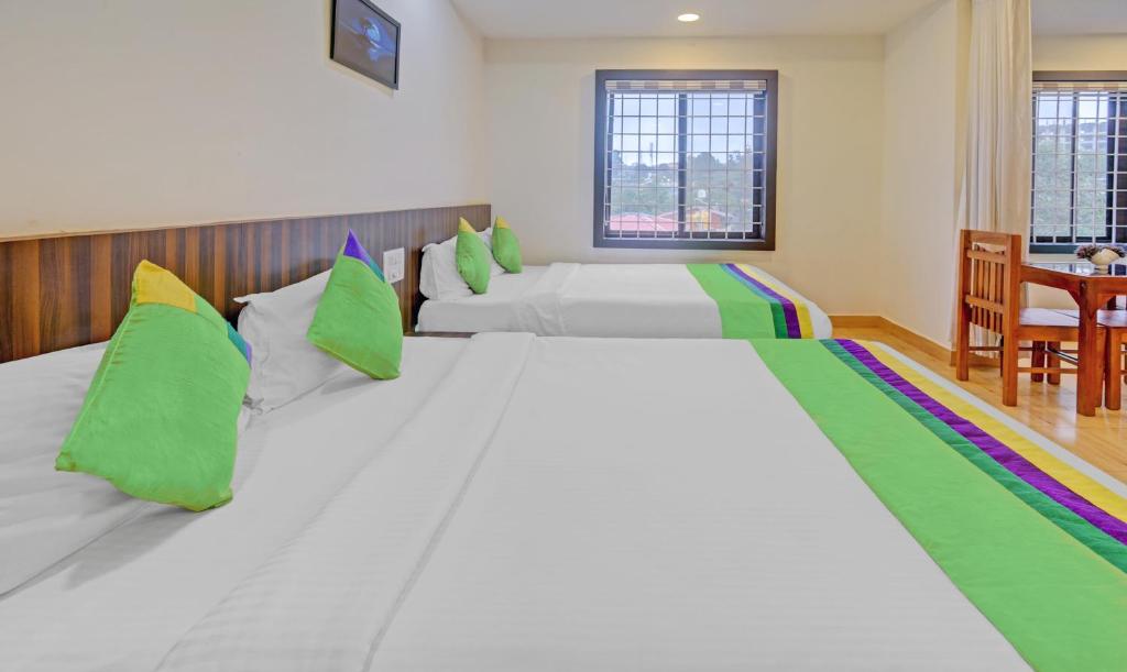 Postel nebo postele na pokoji v ubytování Itsy Hotels Igloo Residency Raja Seat