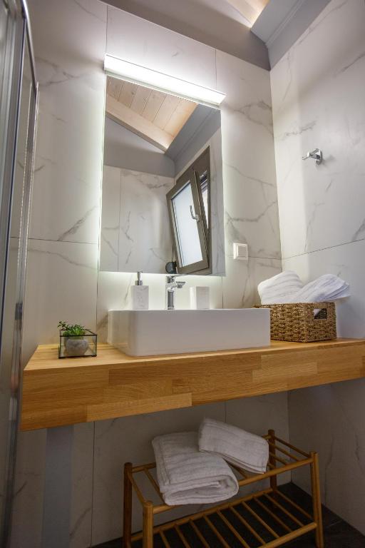 Kúpeľňa v ubytovaní Théa boutique villas sivota II