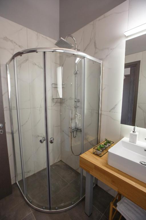 Kúpeľňa v ubytovaní Théa boutique villas sivota II