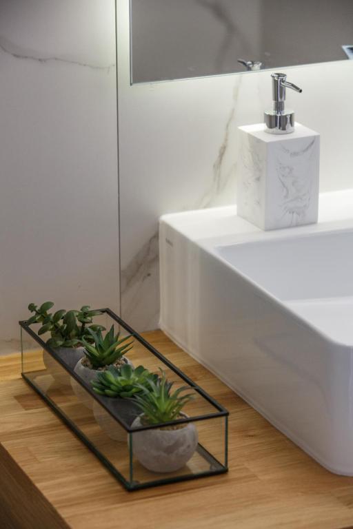 Kúpeľňa v ubytovaní Théa boutique villas sivota II