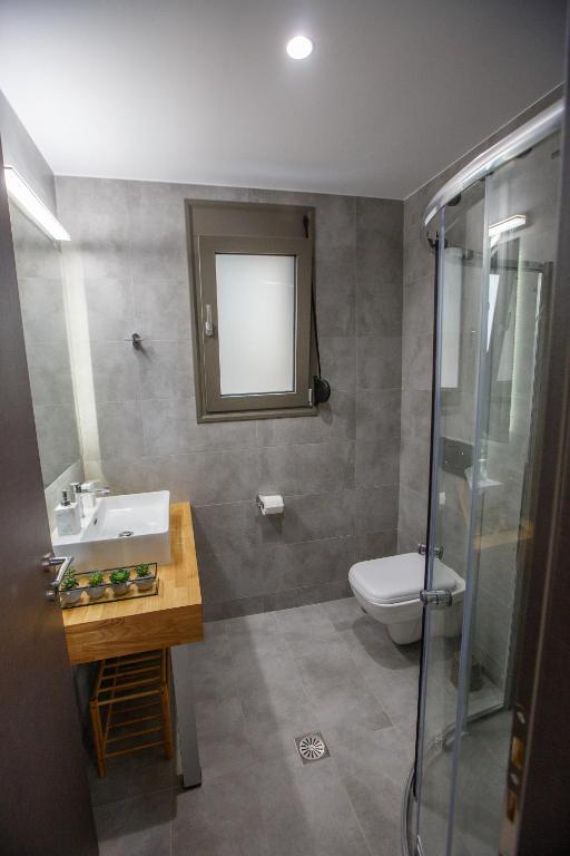 Kúpeľňa v ubytovaní Théa boutique villas sivota II