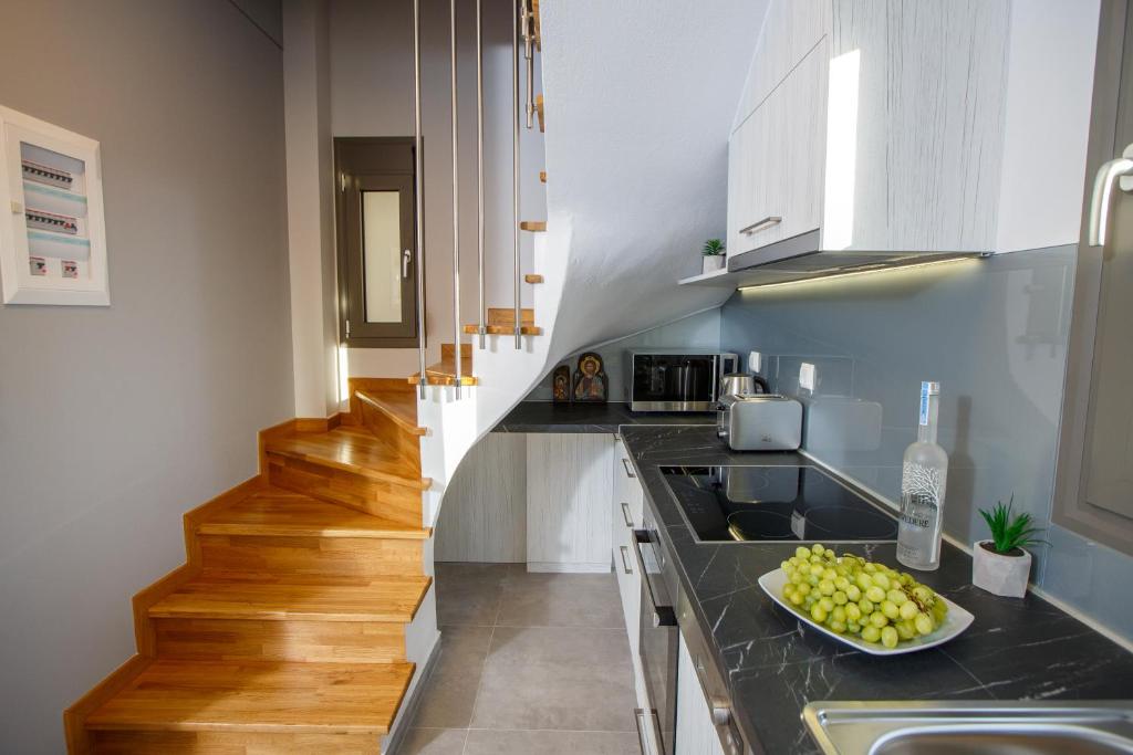 Kuchyňa alebo kuchynka v ubytovaní Théa boutique villas sivota II