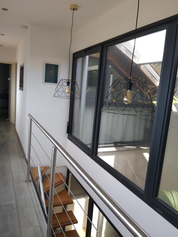 Balkón nebo terasa v ubytování CHAMBRE CHEZ L HABITANT PISCINE VUE MER SDB et TERRASSE PRIVEE