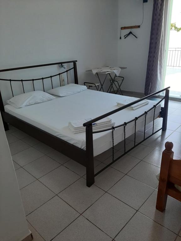 Postel nebo postele na pokoji v ubytování Valentina Rooms