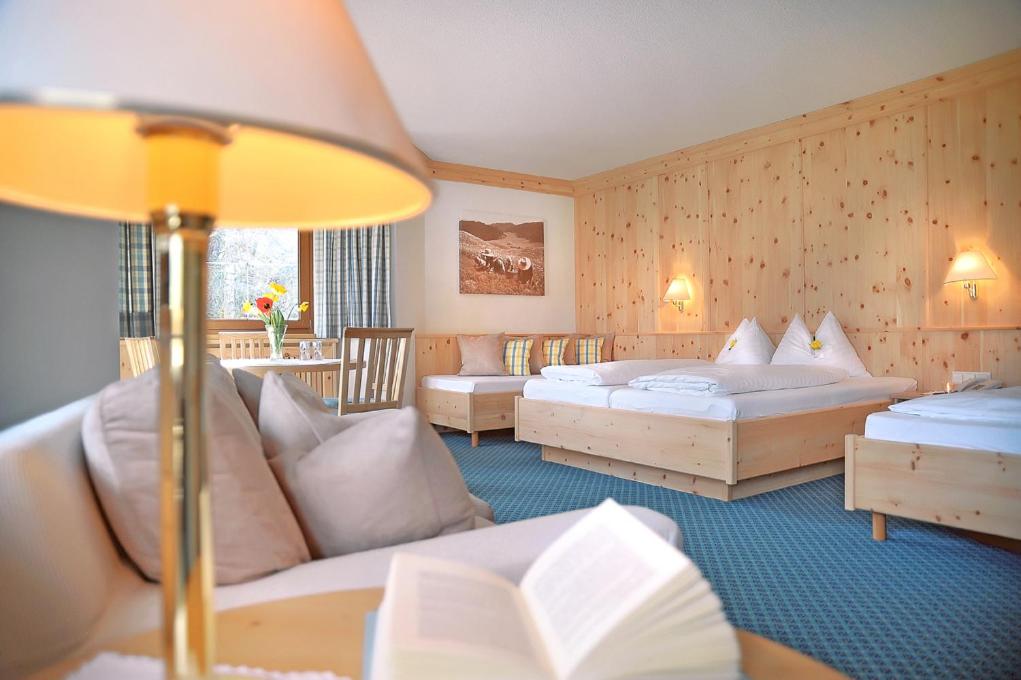Ein Bett oder Betten in einem Zimmer der Unterkunft Natur Resort RISSBACHER