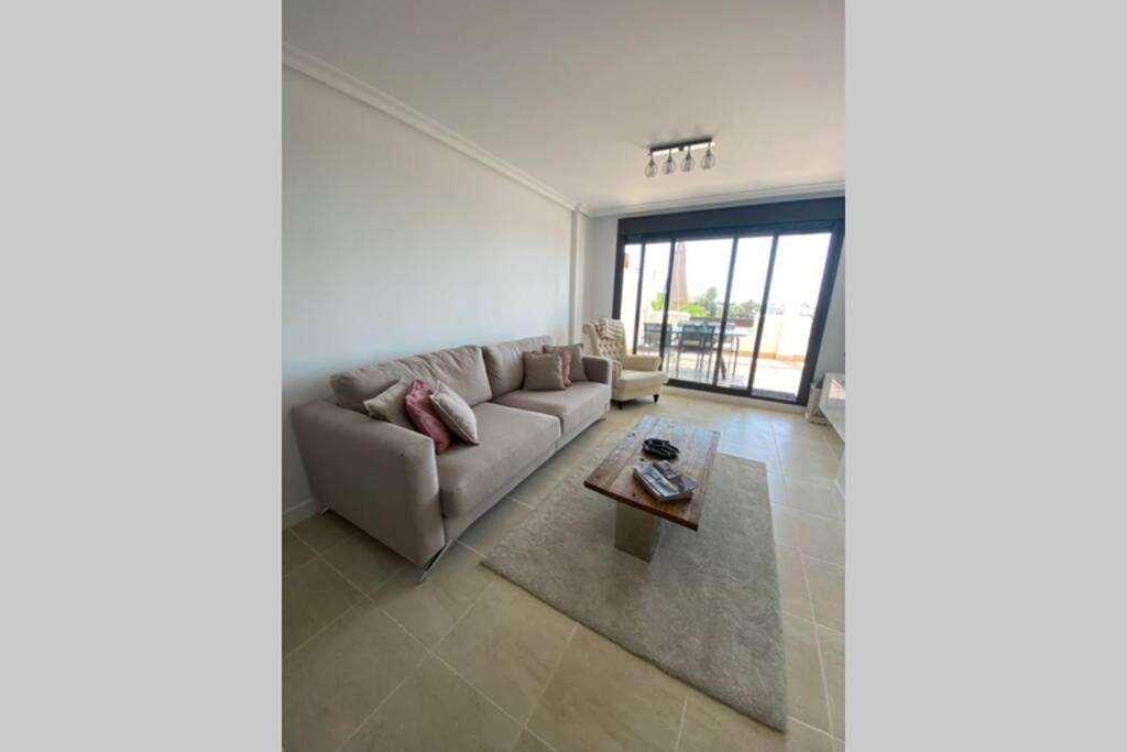 Posezení v ubytování Sunset Resina Golf - 2 Bedrooms Apartment with Sea view - Estepona