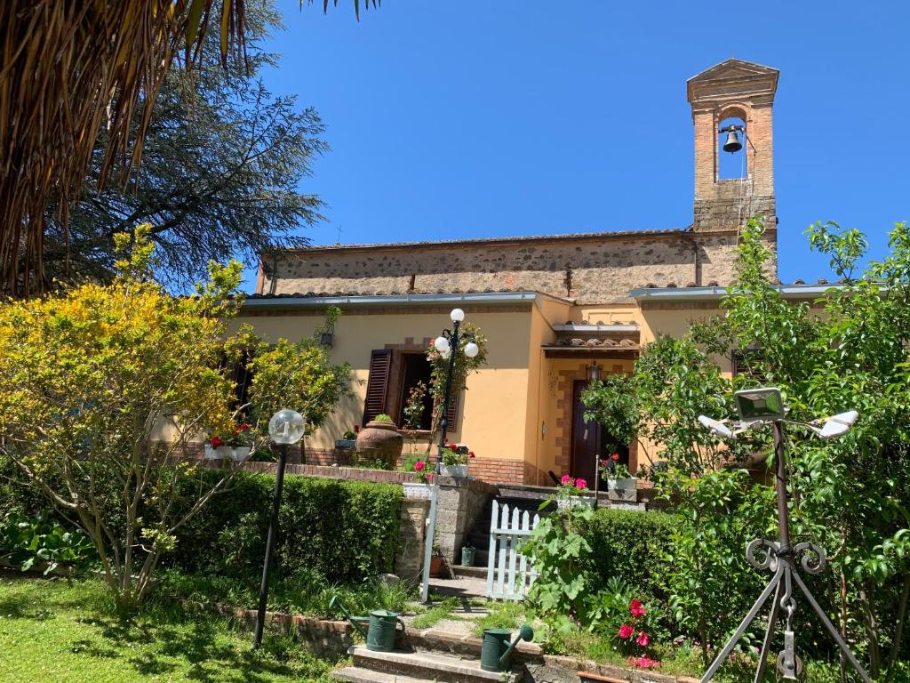 a house with a camera in front of it at VILLA STELLA in Montalcino