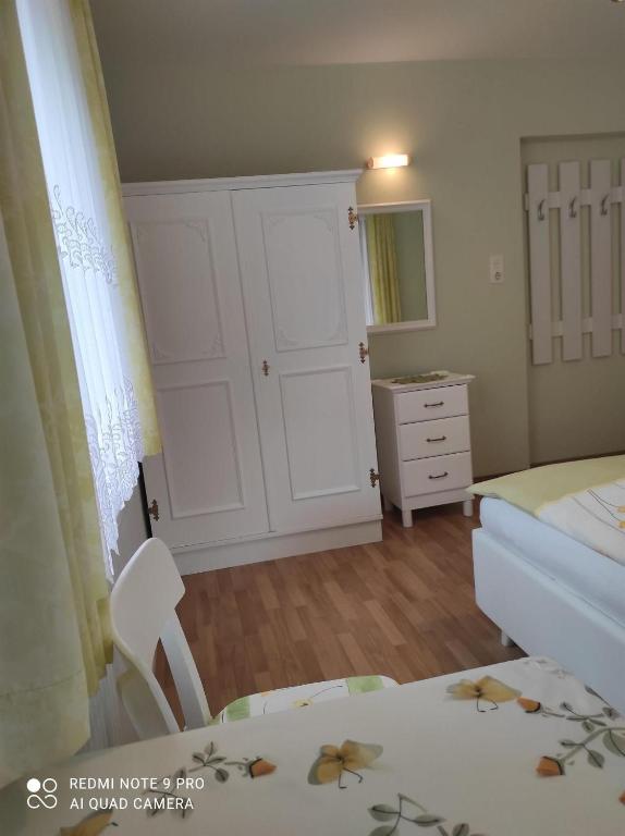 Postel nebo postele na pokoji v ubytování Haus Mühlenheim