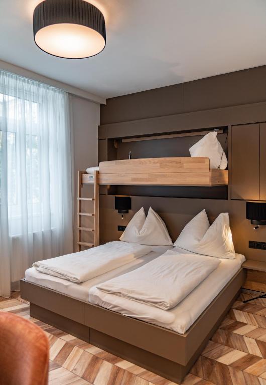 Postel nebo postele na pokoji v ubytování Villa Elisa