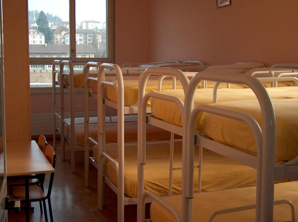 Postel nebo postele na pokoji v ubytování HéberGement du POD