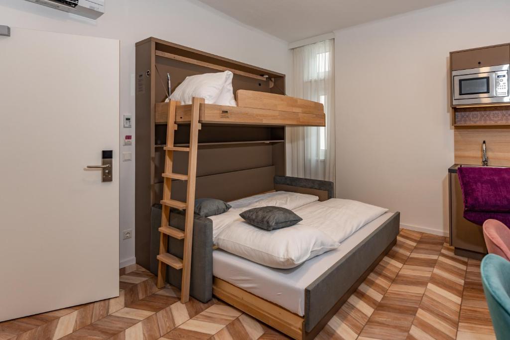 Postel nebo postele na pokoji v ubytování Villa Elisa