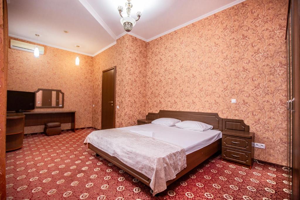 Postel nebo postele na pokoji v ubytování Almira Orion Group Hotel