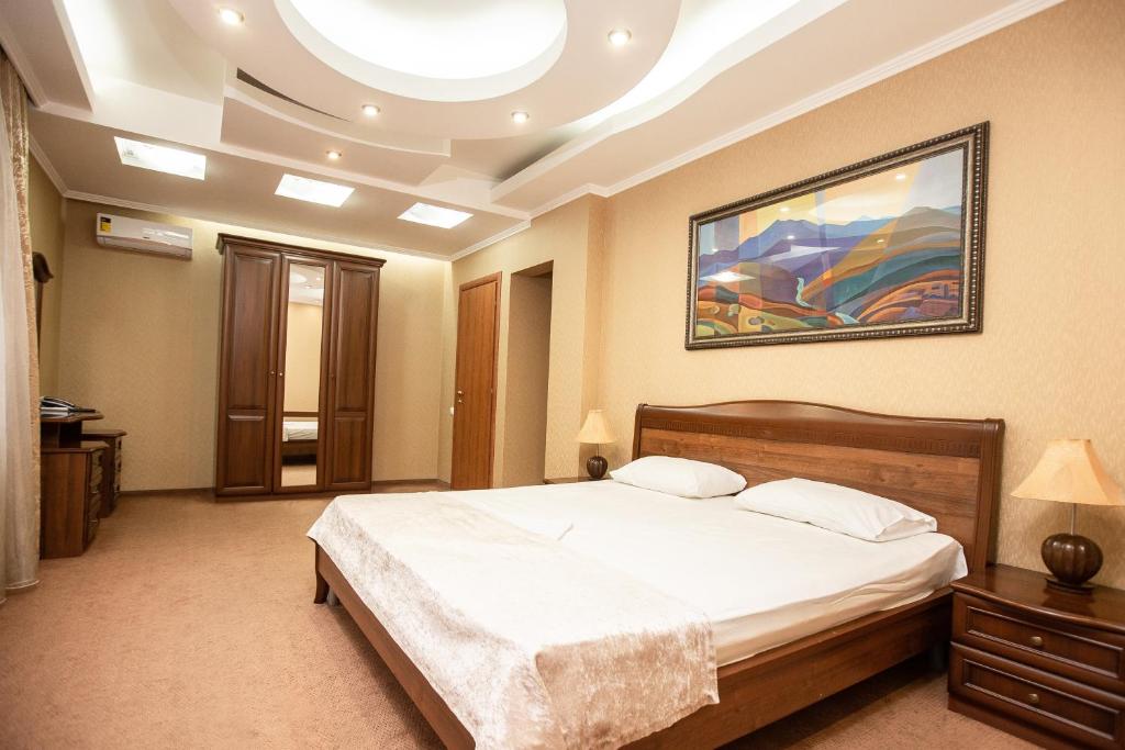 Postel nebo postele na pokoji v ubytování Almira Orion Group Hotel