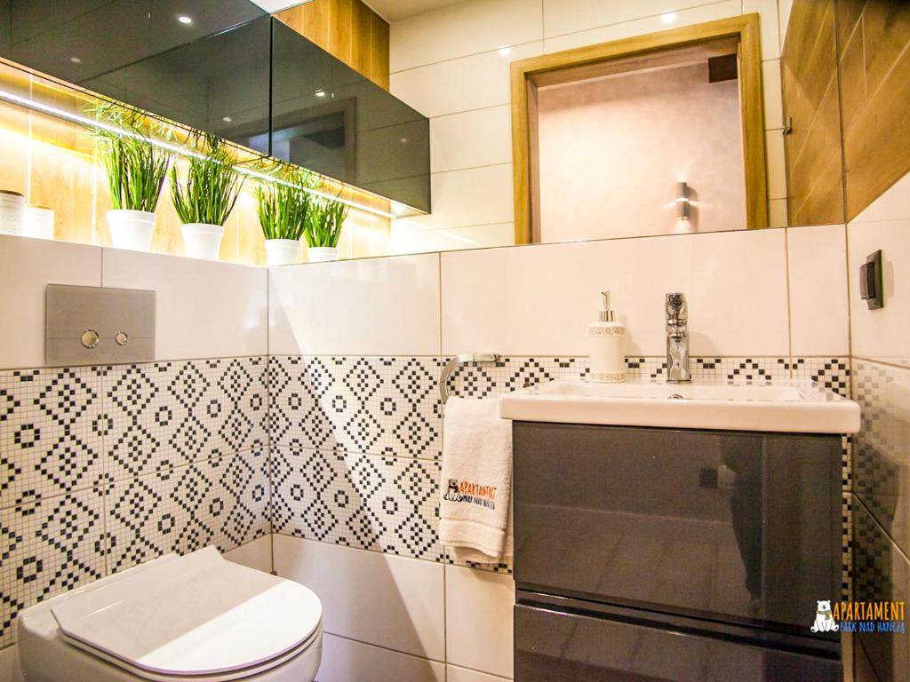 Kúpeľňa v ubytovaní Apartament Park nad Hańczą