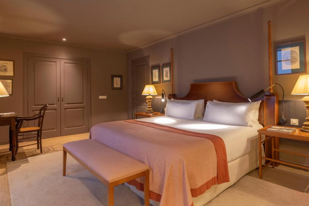 Postel nebo postele na pokoji v ubytování Hotel Can Cera