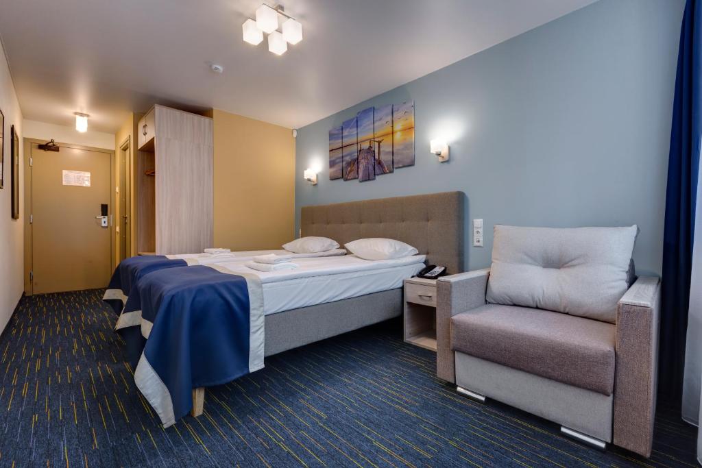 Postel nebo postele na pokoji v ubytování Liivarand Hotel