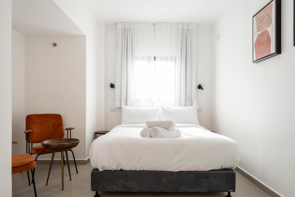 Postel nebo postele na pokoji v ubytování De' Mar Florentine Hotel By Peraia