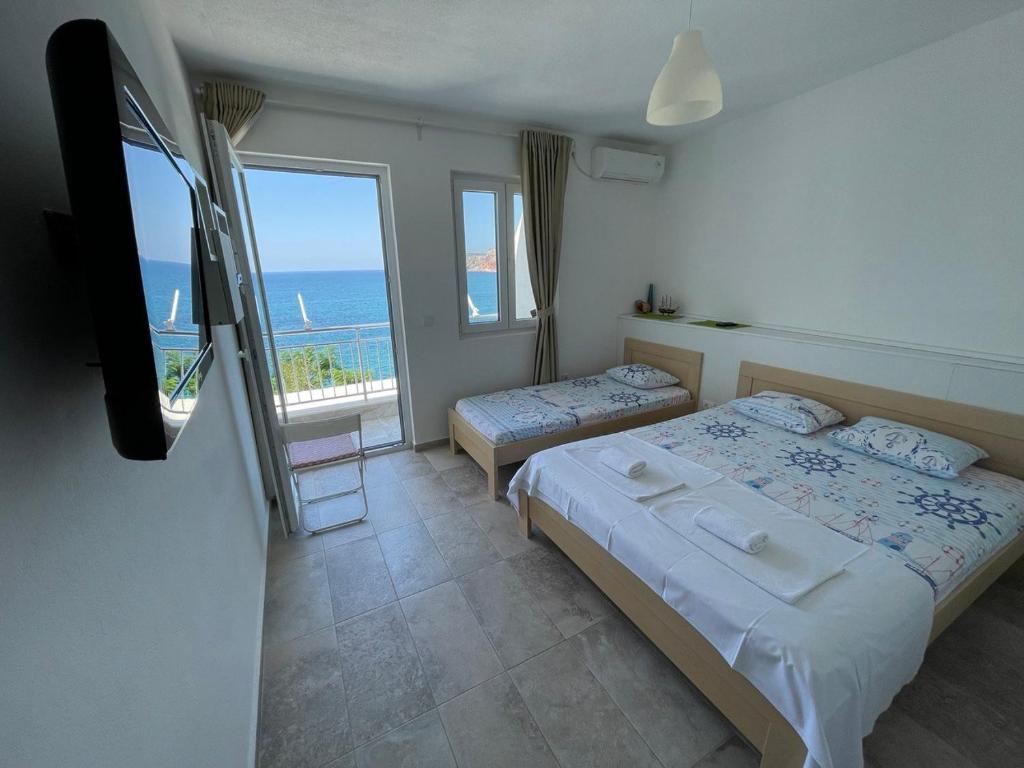 Postel nebo postele na pokoji v ubytování Two Palms Apartment