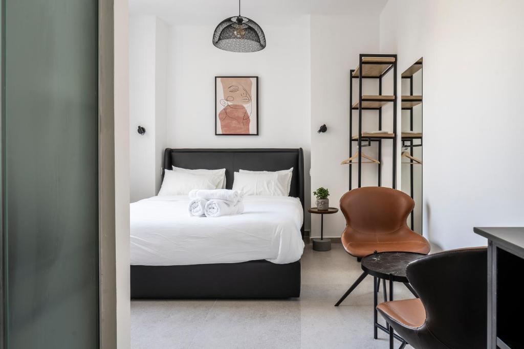 Postel nebo postele na pokoji v ubytování De' Mar Florentine Hotel By Peraia