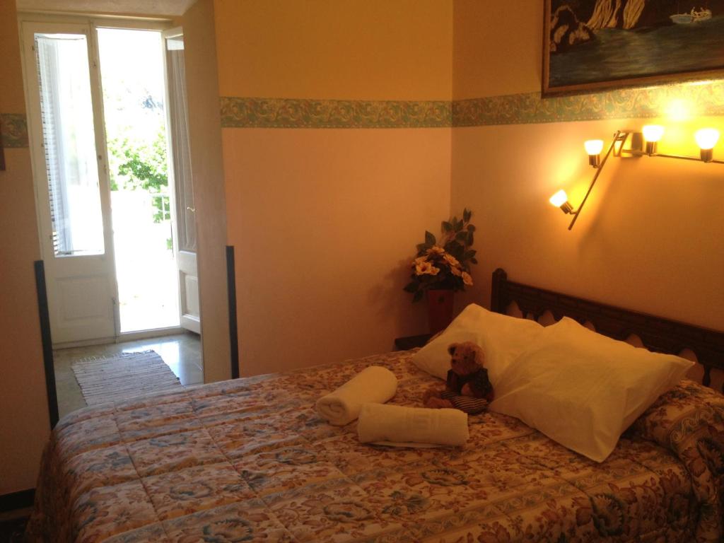 Postel nebo postele na pokoji v ubytování Hotel Comodoro