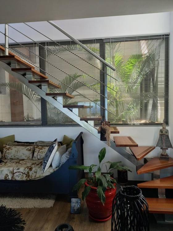 Posezení v ubytování CHAMBRE CHEZ L HABITANT PISCINE VUE MER SDB et TERRASSE PRIVEE