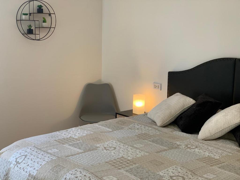 Postel nebo postele na pokoji v ubytování SMartspot Rosia