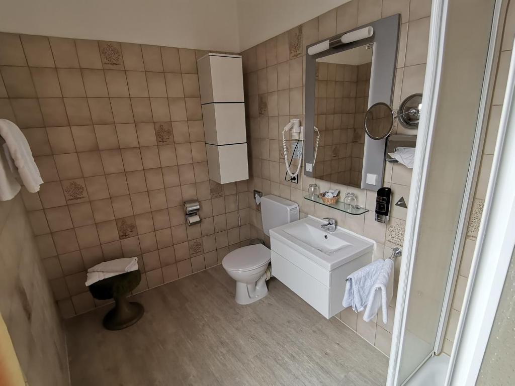 Koupelna v ubytování Hotel Kitzinger Hof an der B8