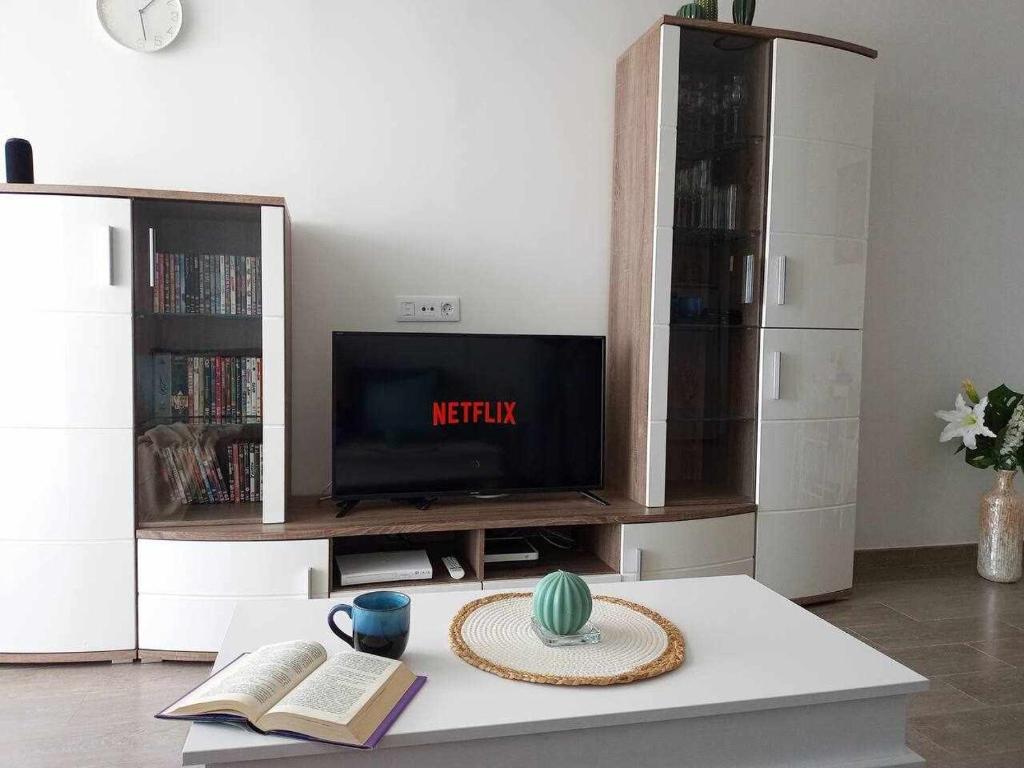 Televízia a/alebo spoločenská miestnosť v ubytovaní Los Molinos Luxury y Relax