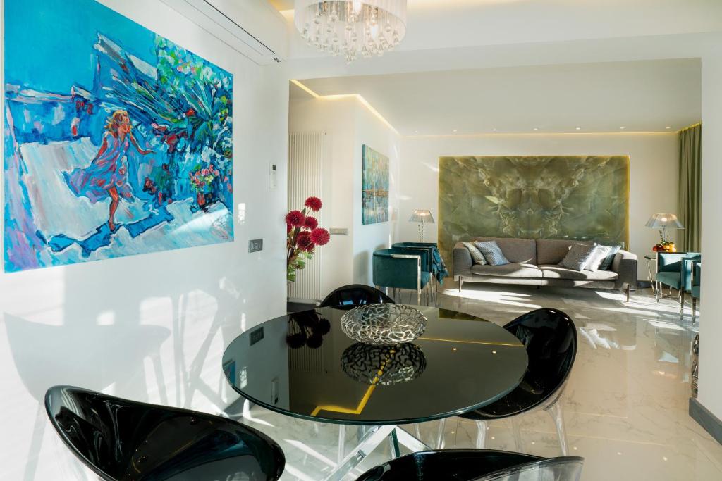 A seating area at Luxury Beachfront Apartment Taormina Pool and Parking