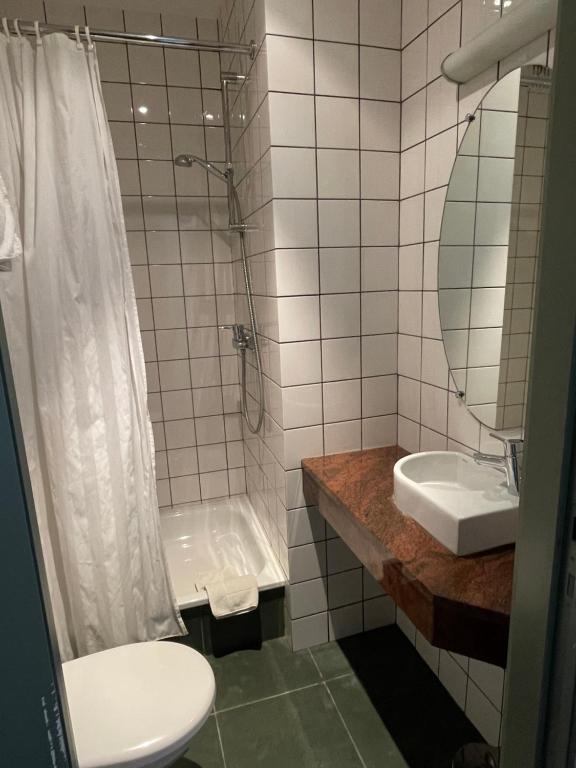 Koupelna v ubytování Hotel Malcot