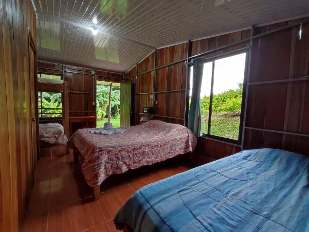 Cama o camas de una habitación en Casitas de Montaña Cabuya