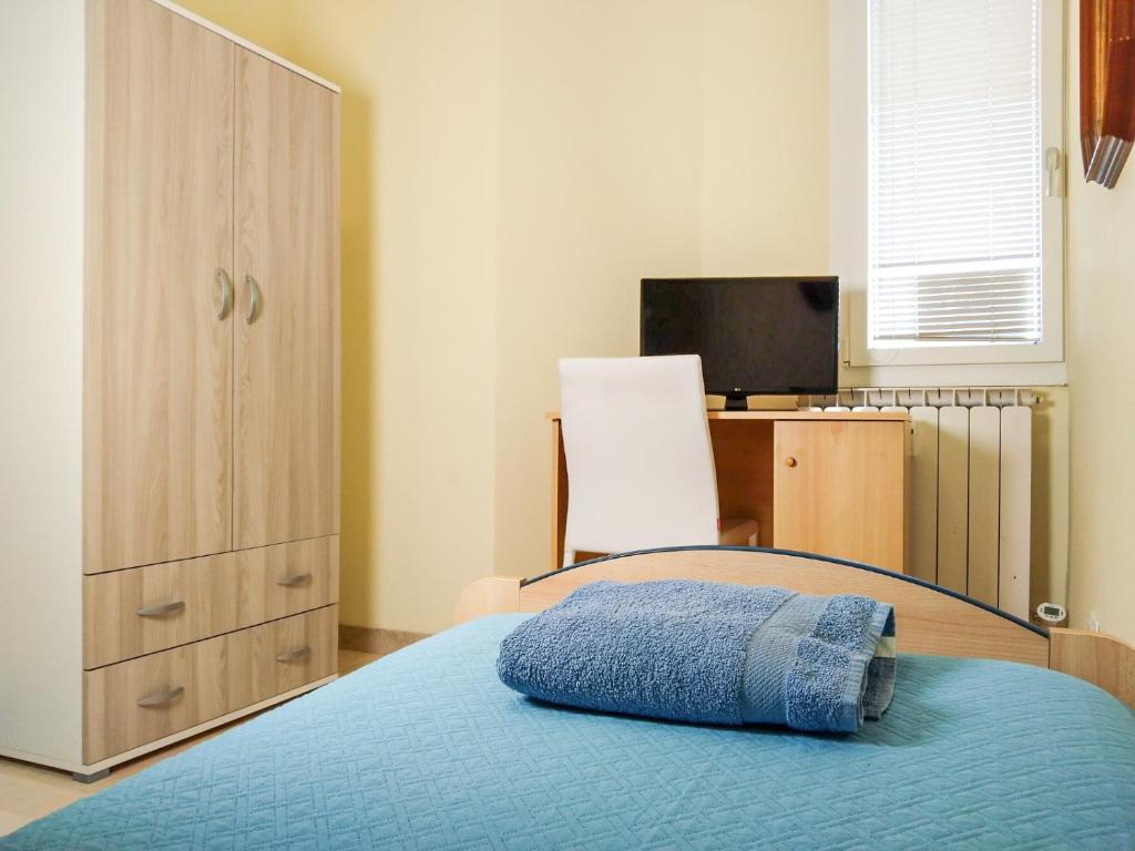 Postel nebo postele na pokoji v ubytování Casa Bignardi - Affitti Brevi Italia