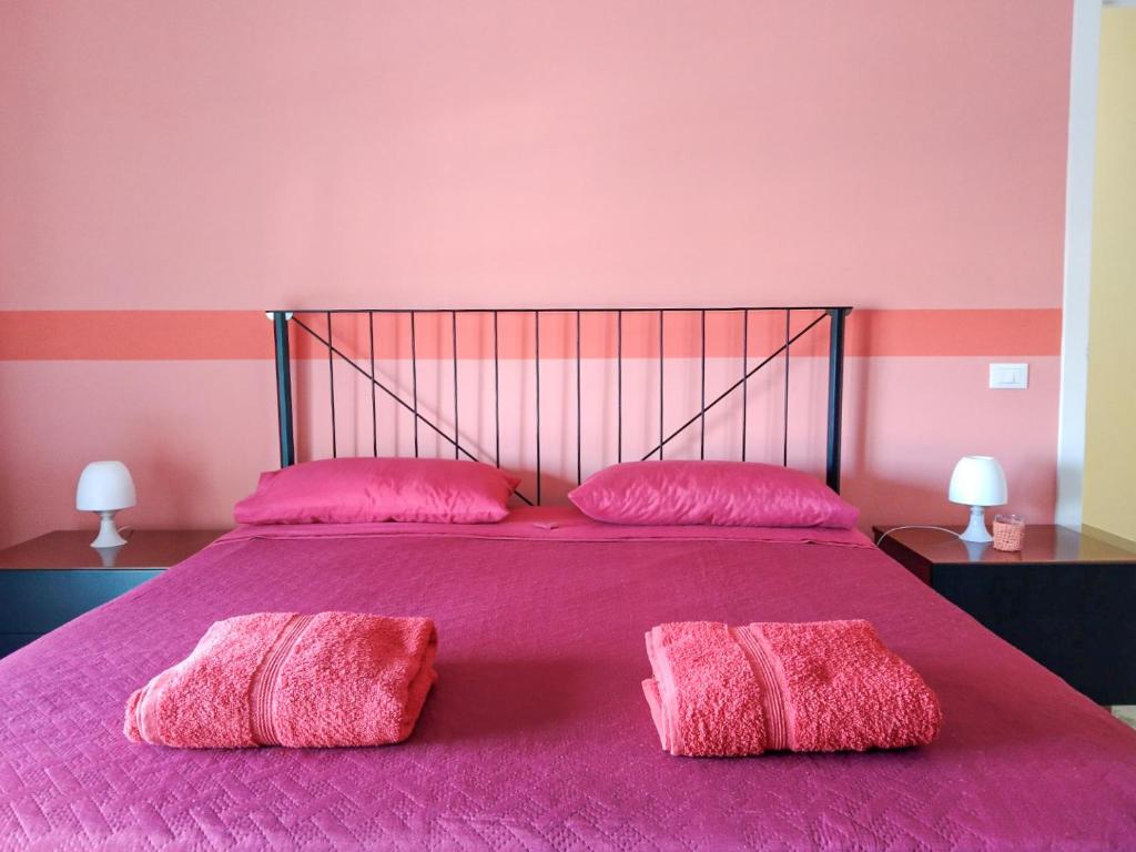Postel nebo postele na pokoji v ubytování Casa Bignardi - Affitti Brevi Italia