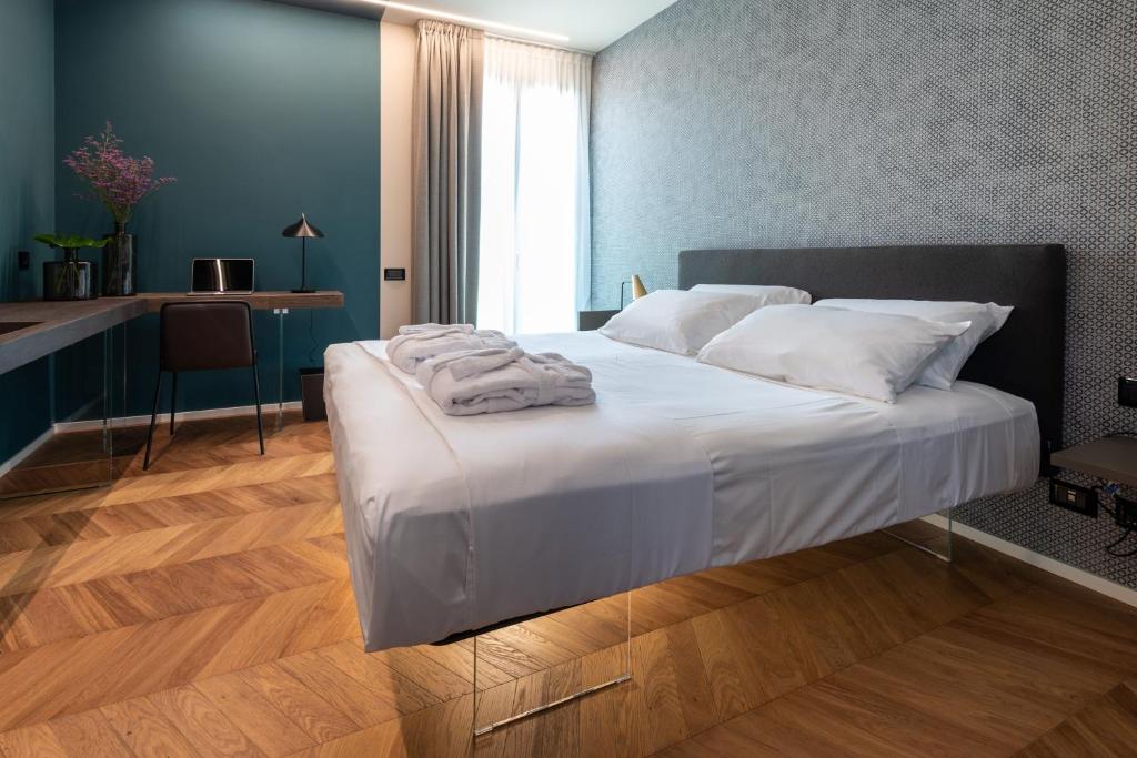 Postel nebo postele na pokoji v ubytování Demo Hotel Design Emotion