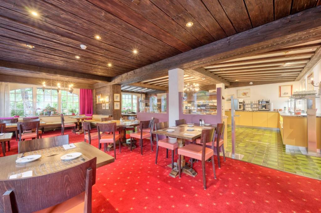Un restaurante o sitio para comer en Naco Aparthotel by Arca Spa